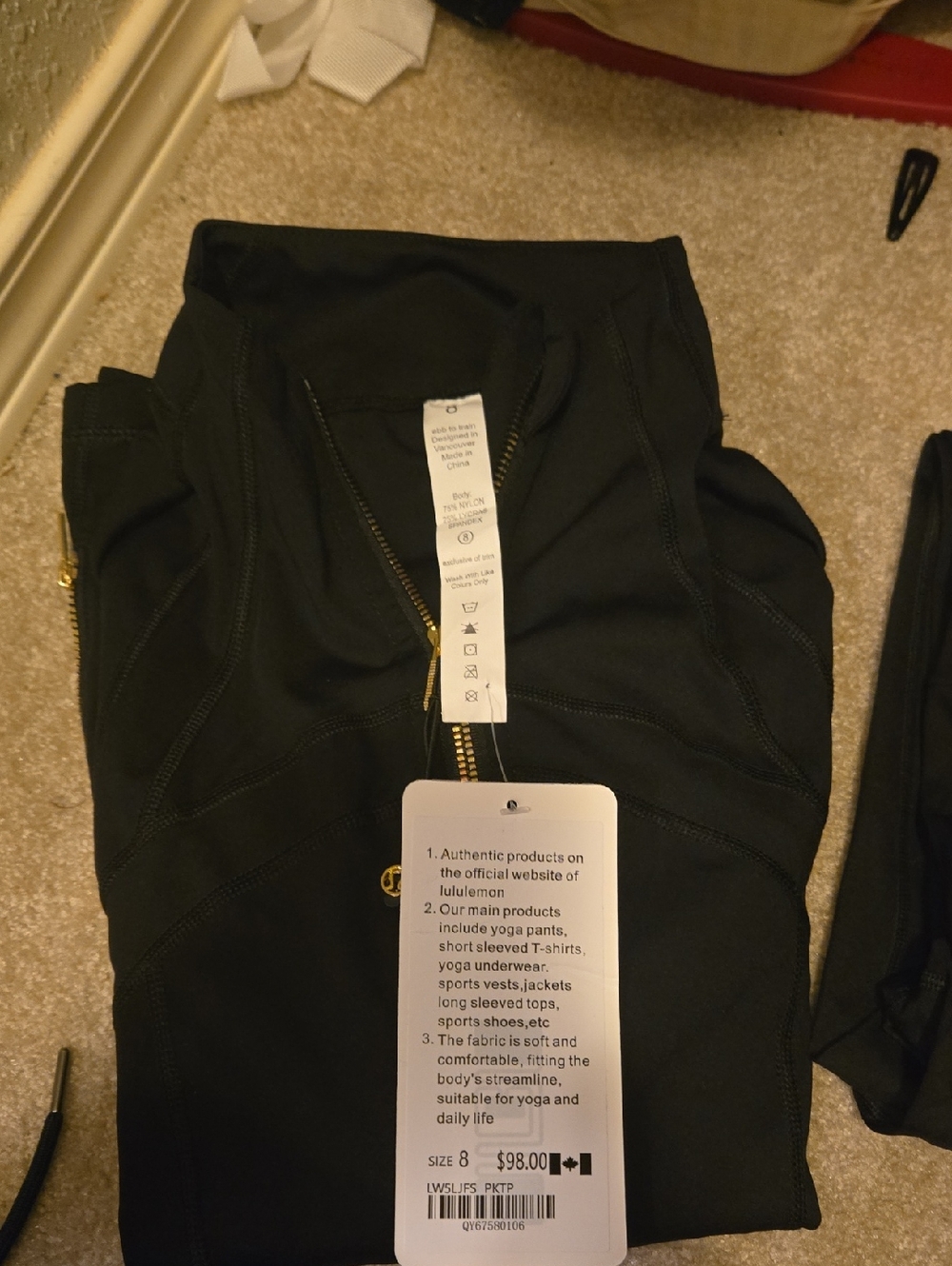 lululemon athletica Black Jacket with Gold Zipper Detail